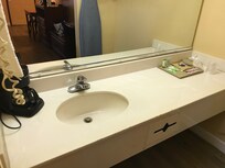 Sink outside the bathroom. No Kleenex provided.