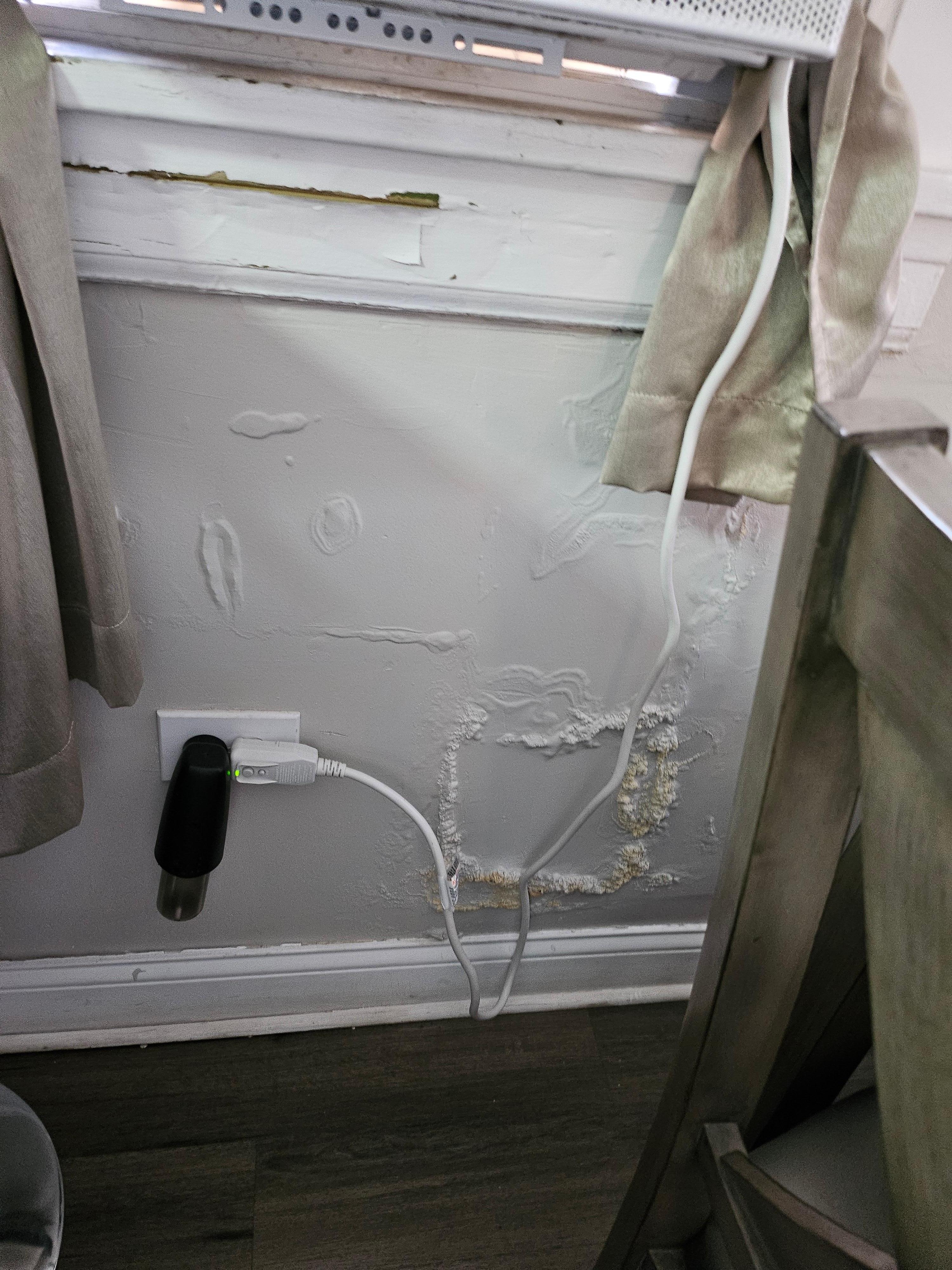 Air conditioner messing up wall.