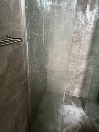 Shower glass doors not cleaned properly so much soap scum.