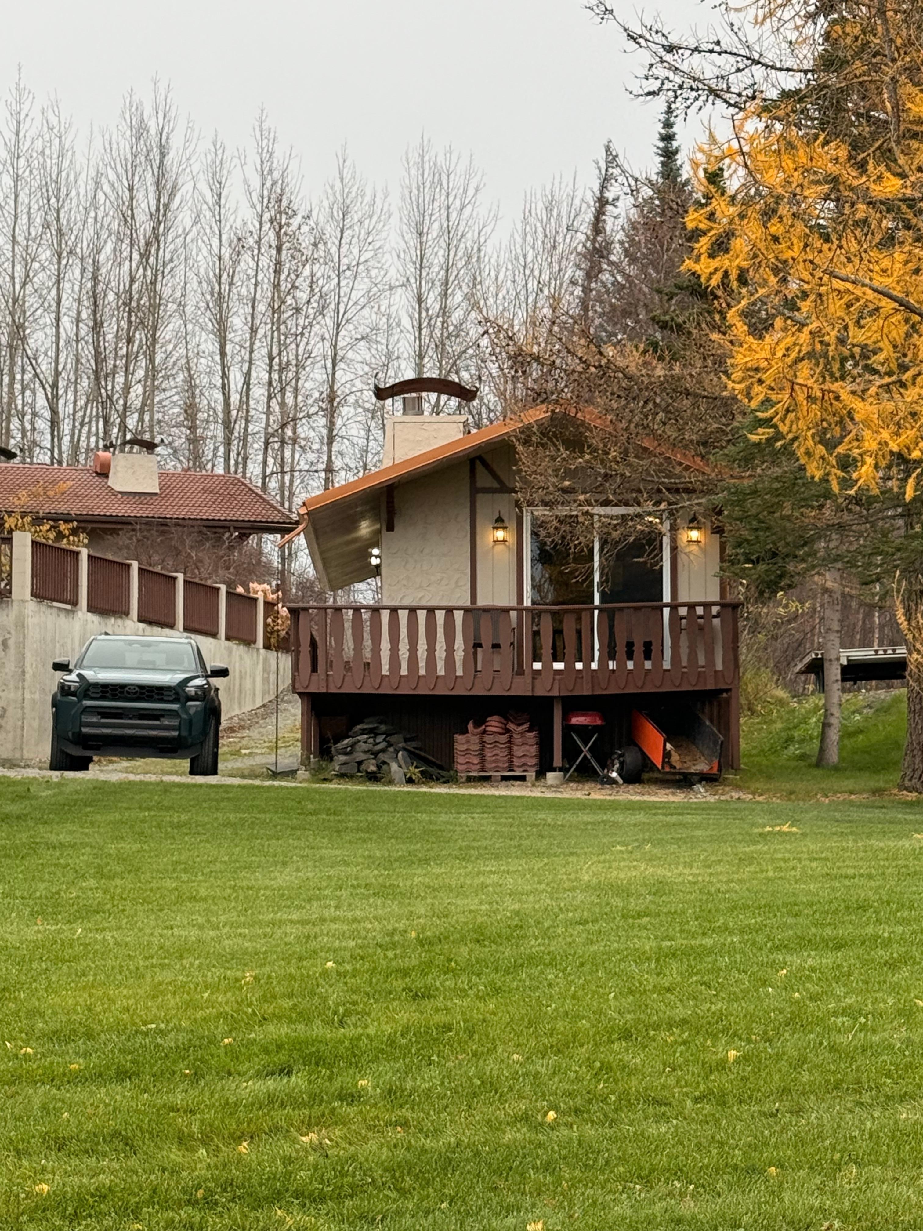 Cabin view from the lake with the glorious golden larch showing off! 