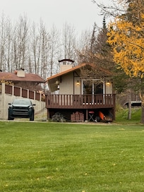 Cabin view from the lake with the glorious golden larch showing off!