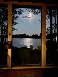 Porch view of moonlight on the lake.