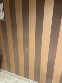 Wallpaper by lifts dirty and marked