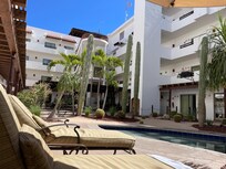 Lounge chairs in the courtyard and poolside.