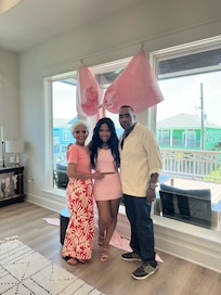 “ Birthday Girl” with mom and dad.