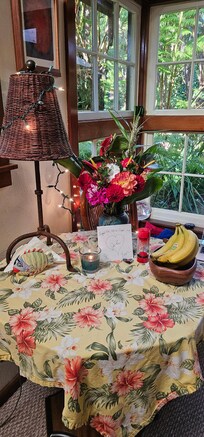 Our anniversary flowers on the table in the living room.