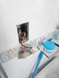 Exposed cords by sink