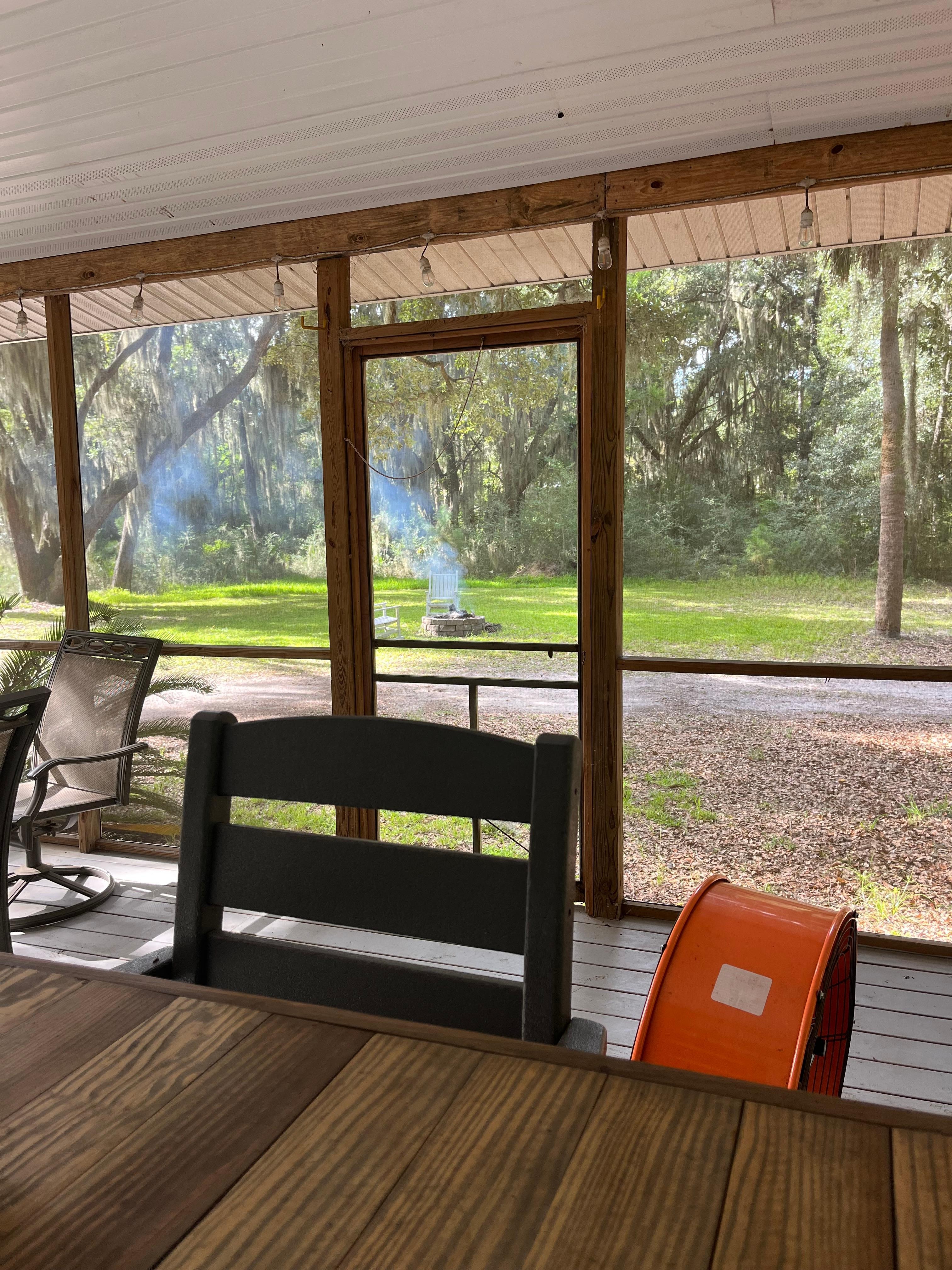 Screened in picnic sitting area.