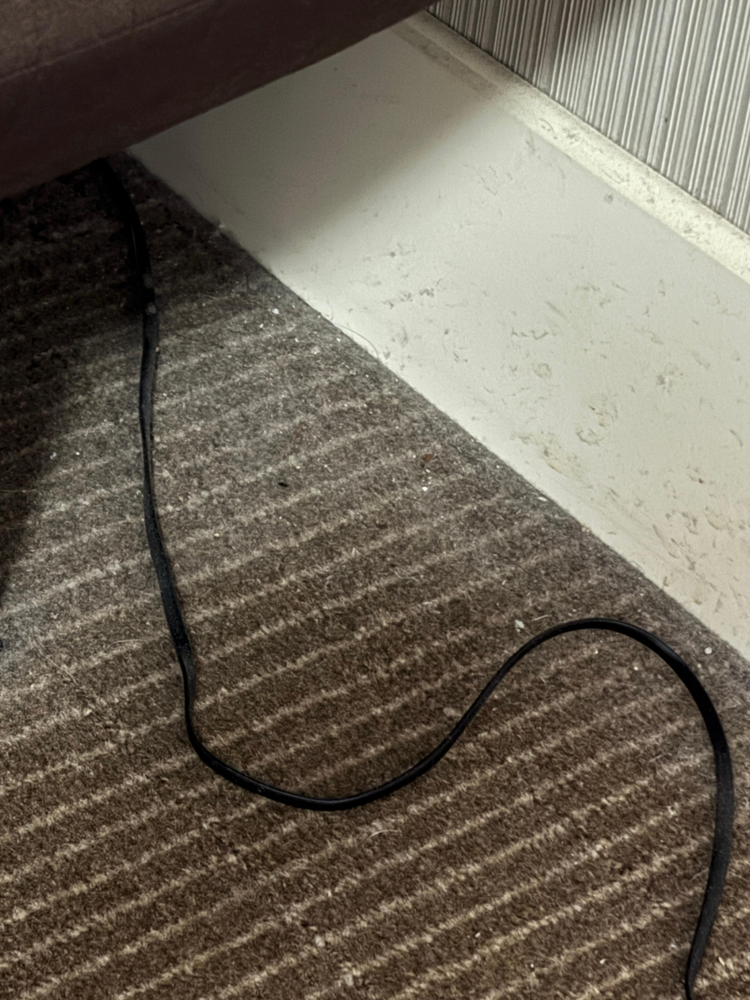 A lot of dust under head board
