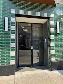 The box is on the right hand side wall to put in the code to get inside.