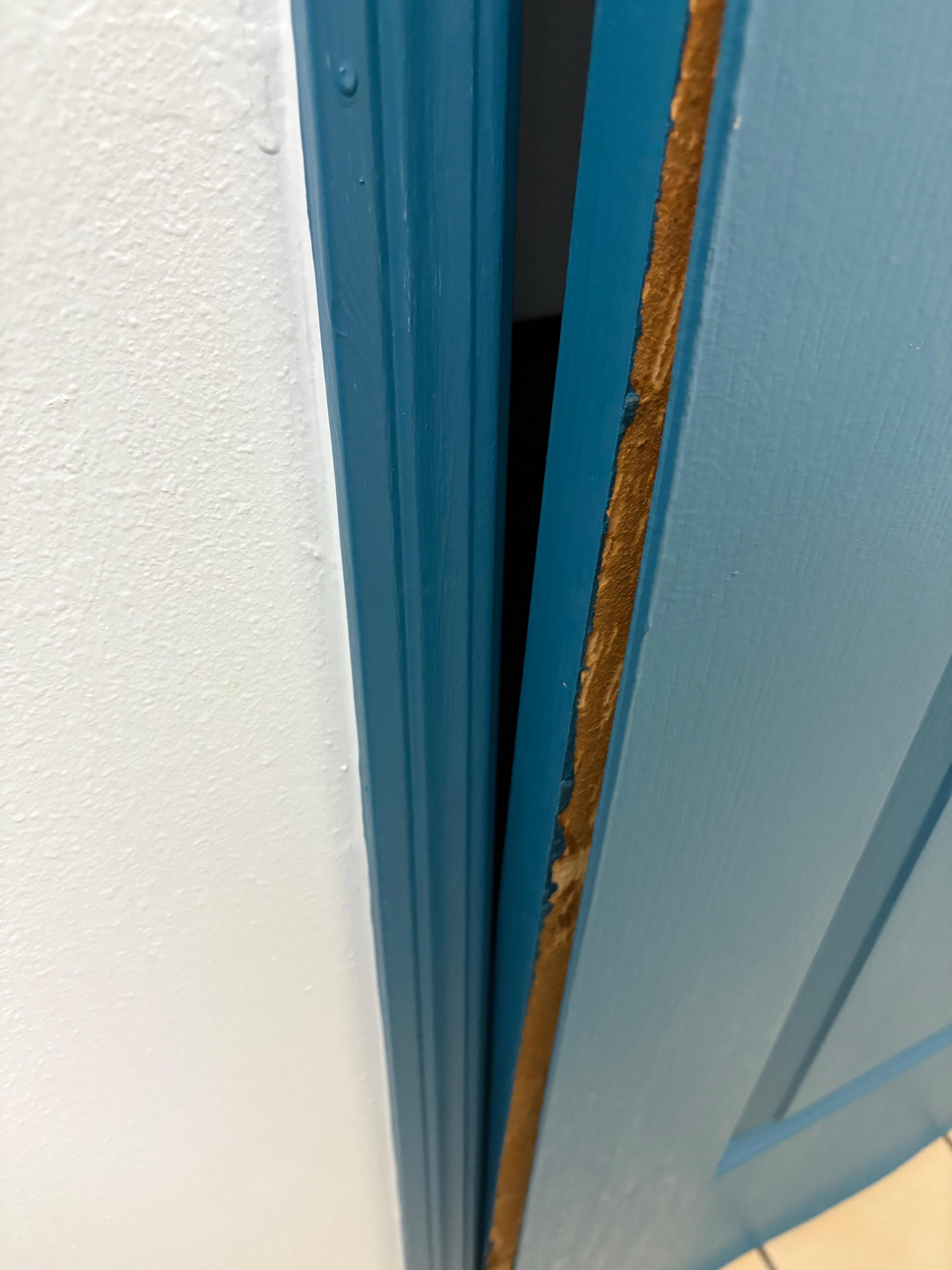 Trying to open the stuck bathroom door