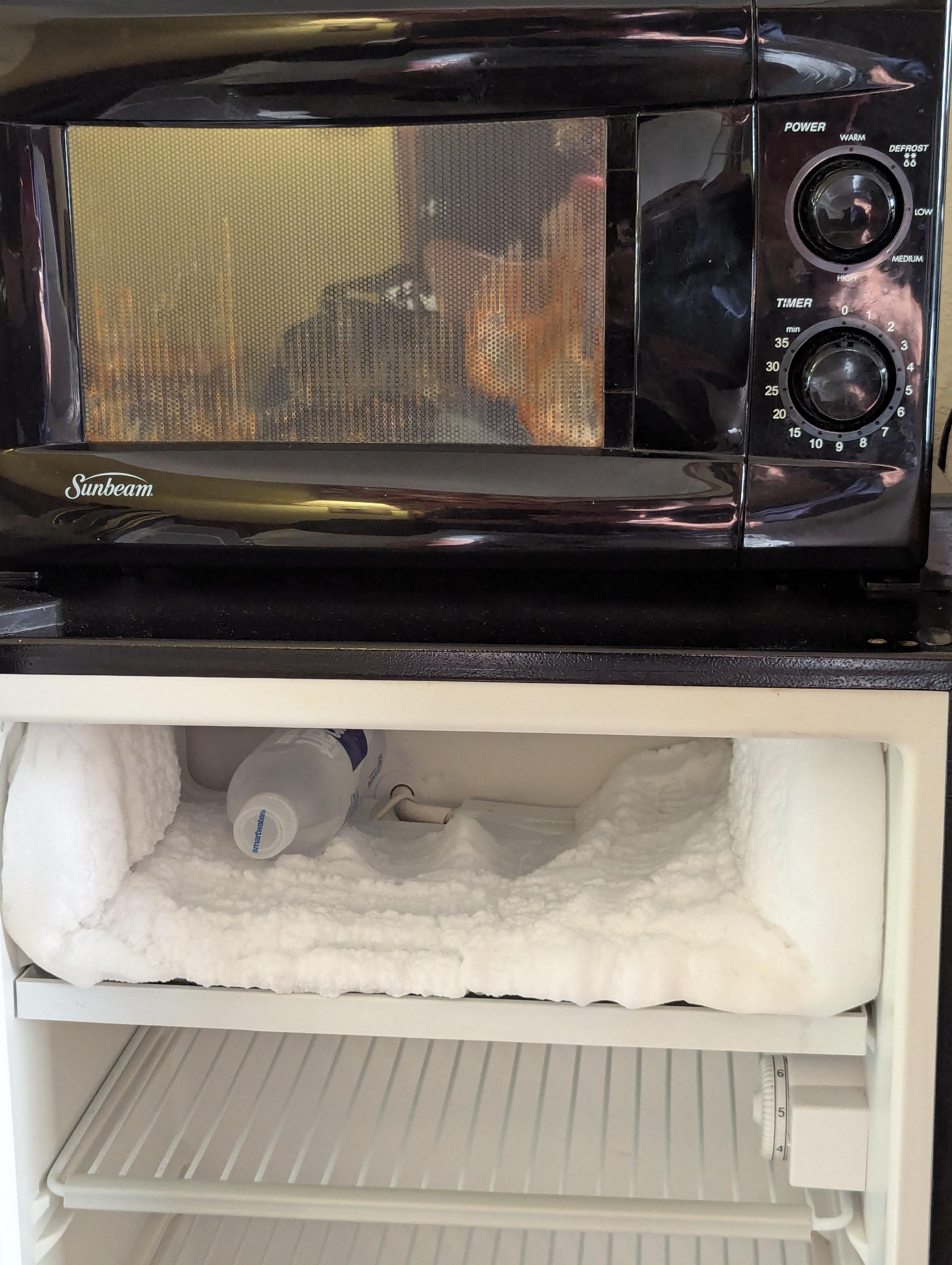 Nasty microwave and fridge not defrosted in awhile
