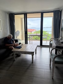 Living area. Couch is to the left. Not as shown in VRBO pictures. Now there’s a slip cover but the couch is out of shape.