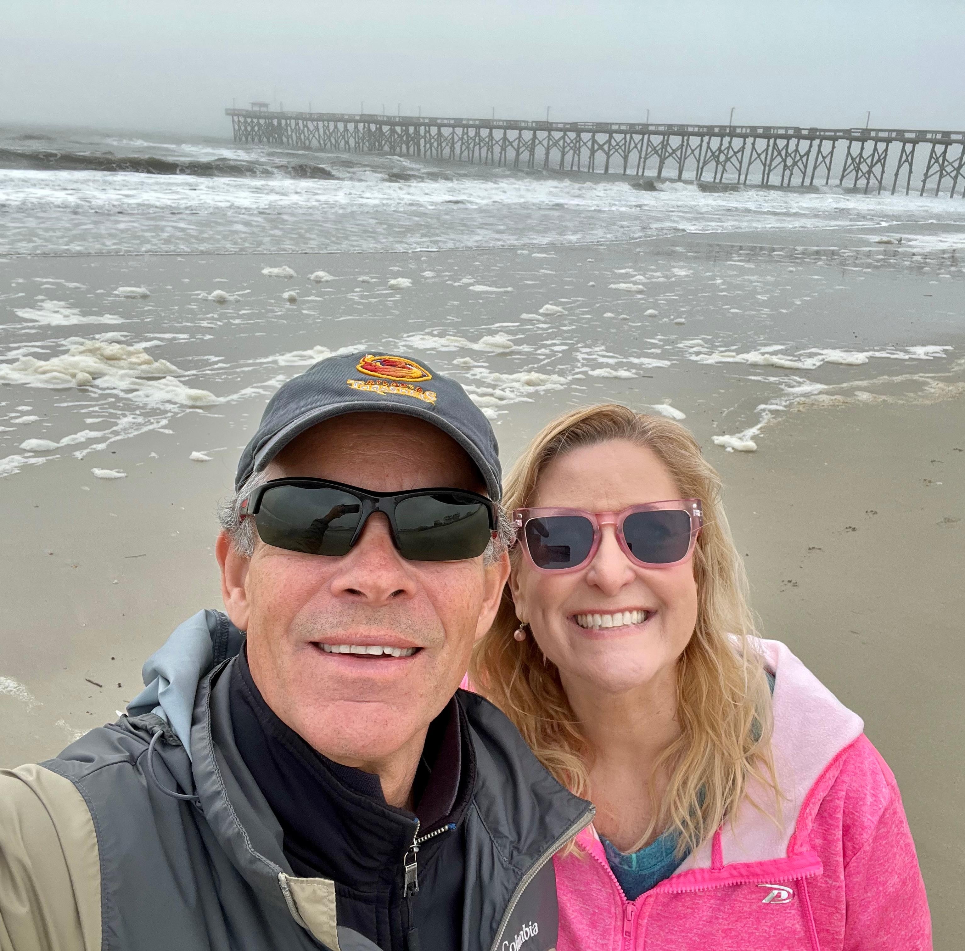 In front of The Oak Island Pier, directly across from The Beach House Motely & Suites!