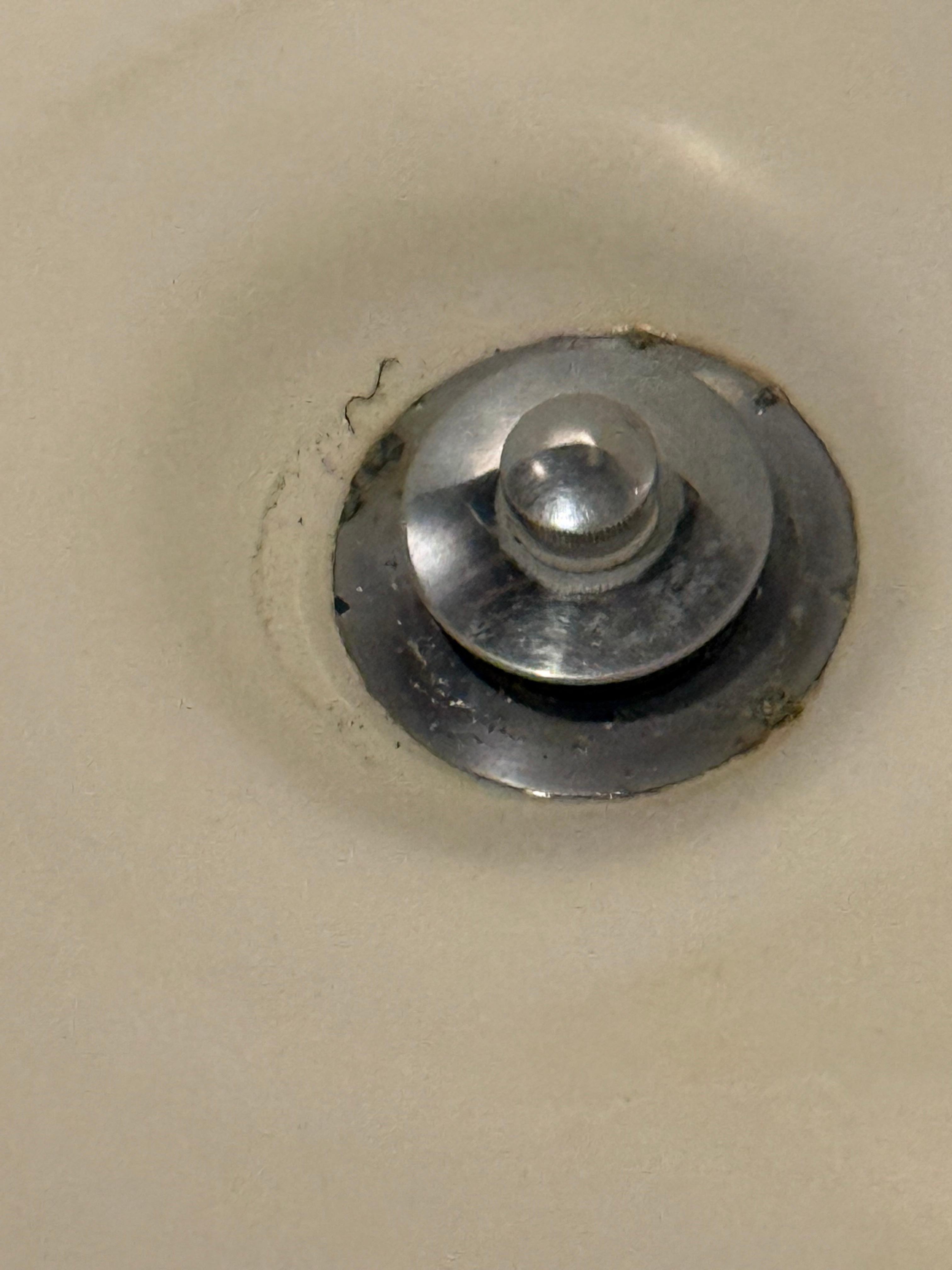 Dirty shower with someone’s hair
