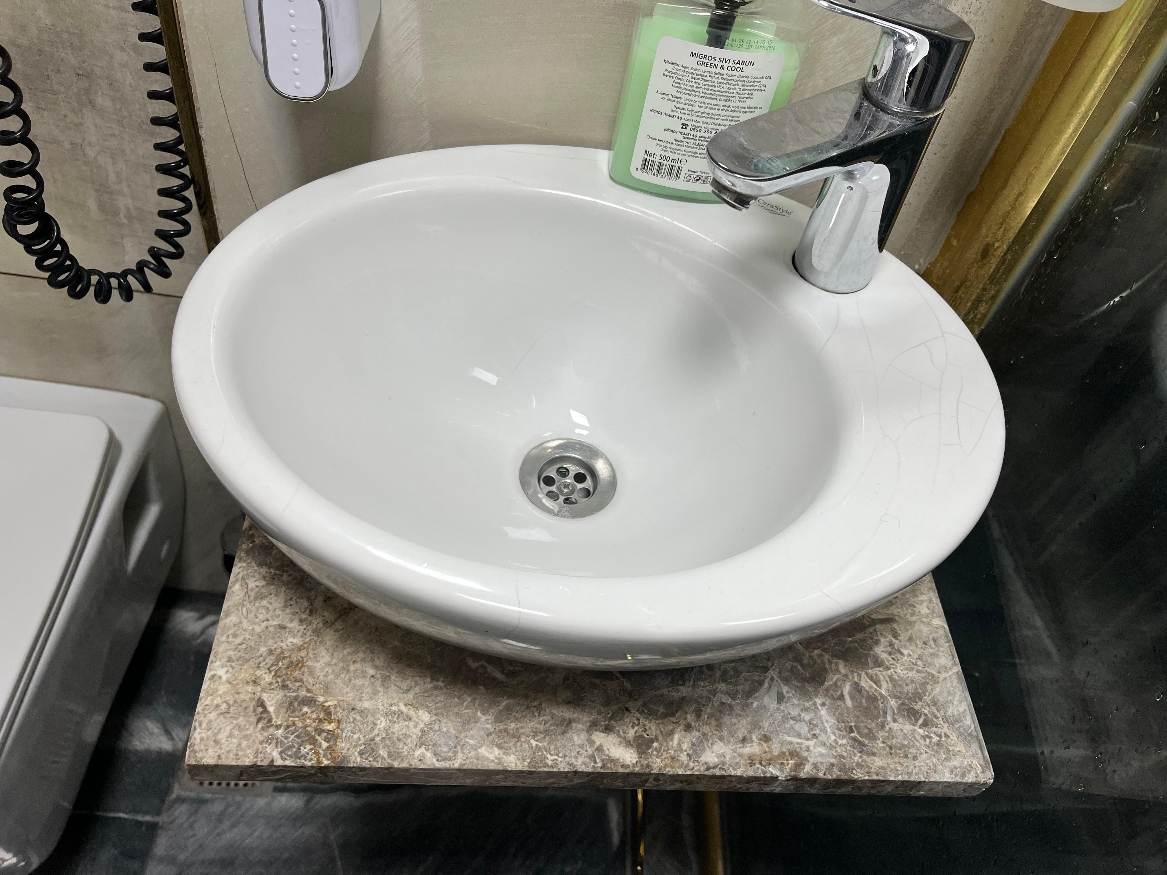 No countertop space. Hand soap dispenser was empty.