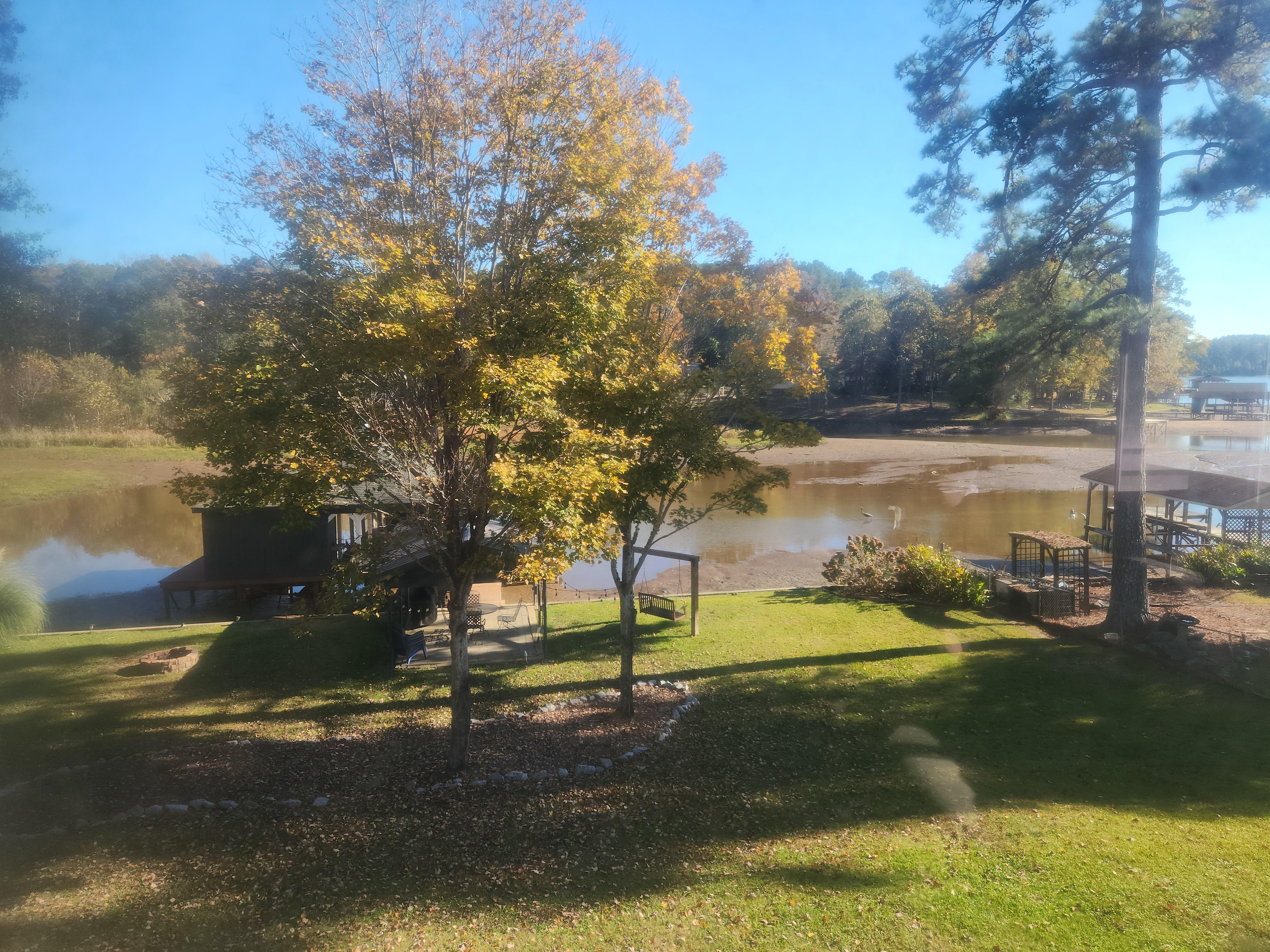 Stunning views from the living room, even with Lake Sinclair's 5-year regular draw-dawn by Georgia Power for lake residents to build and repair seawalls and docks.