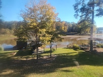 Stunning views from the living room, even with Lake Sinclair's 5-year regular draw-dawn by Georgia Power for lake residents to build and repair seawalls and docks.