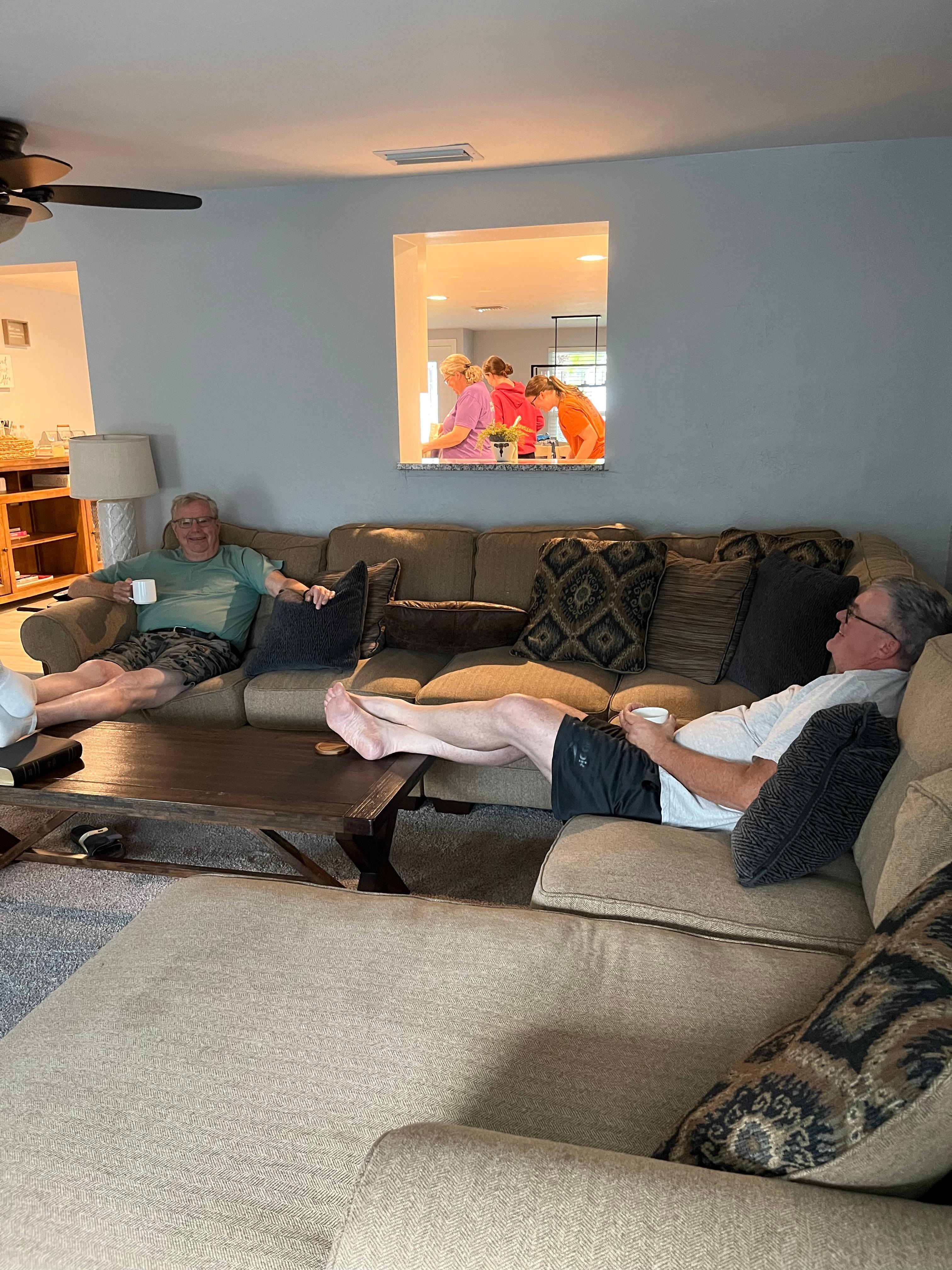 My husband and son-in-law waiting for instructions if we needed more ingredients. 