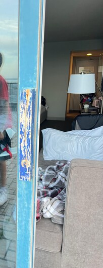 Patio door with makeshift handle.