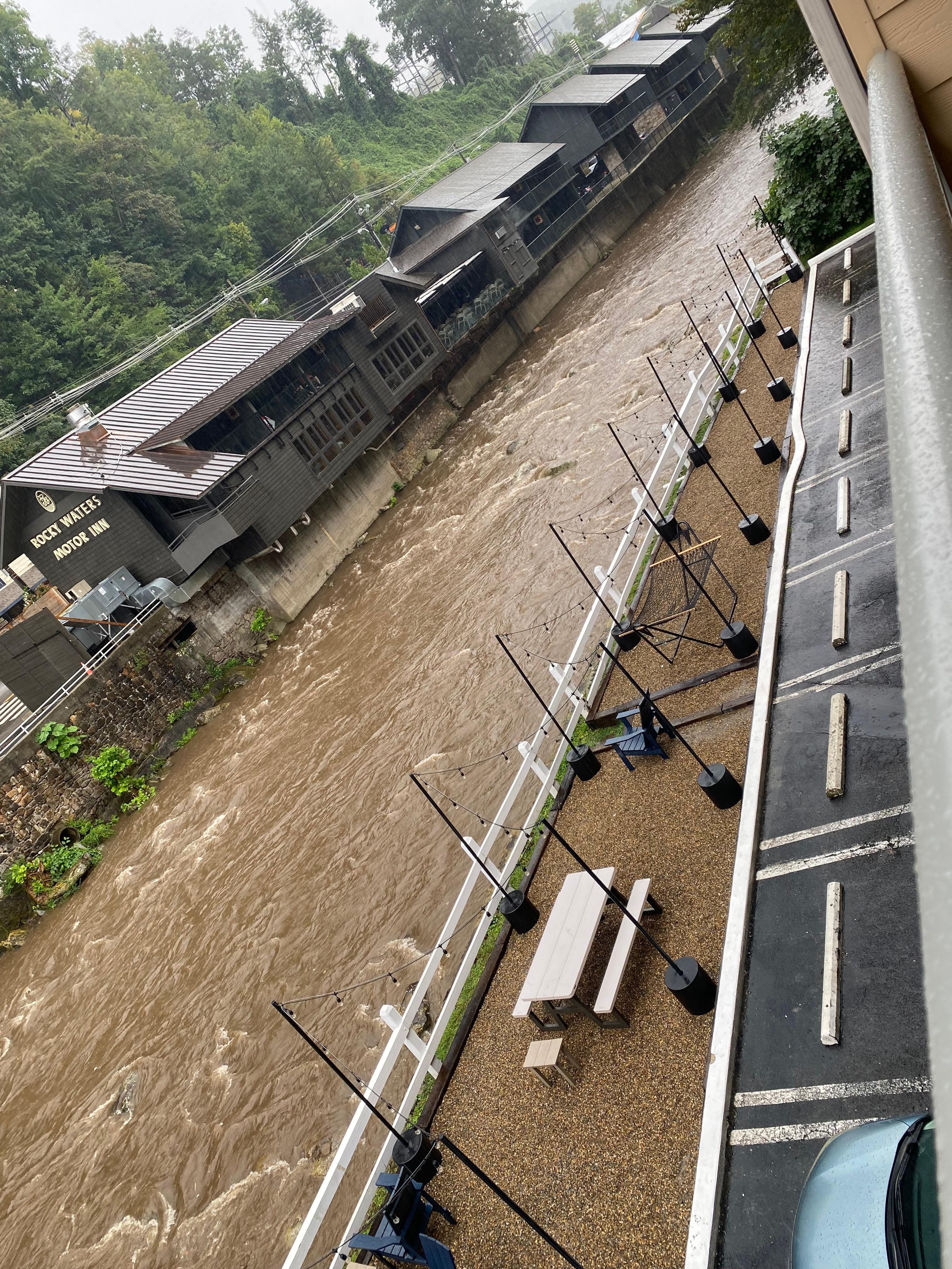 Smoking area with fire pits tables chairs and a hammock