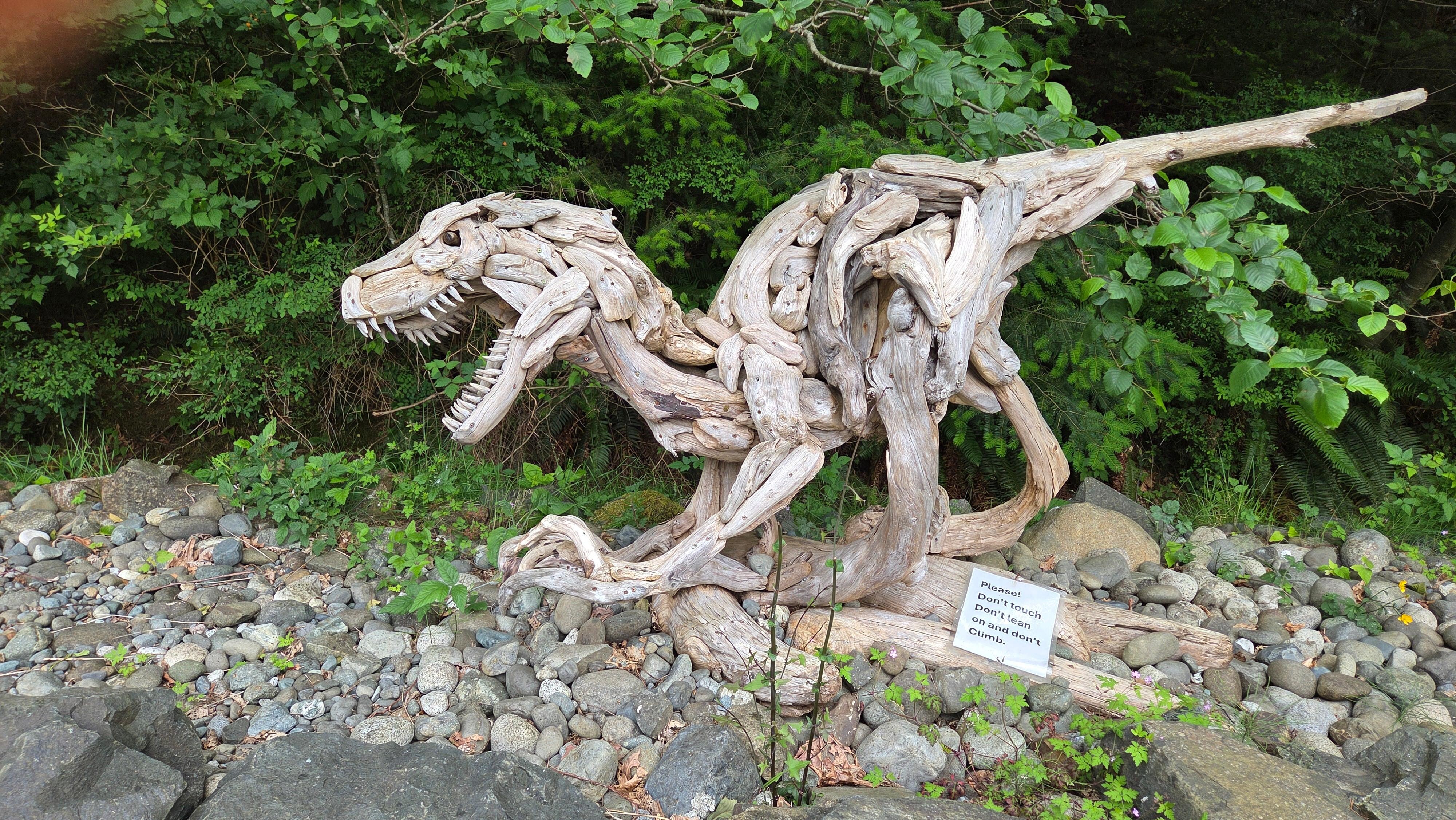 Driftwood scuptures in garden