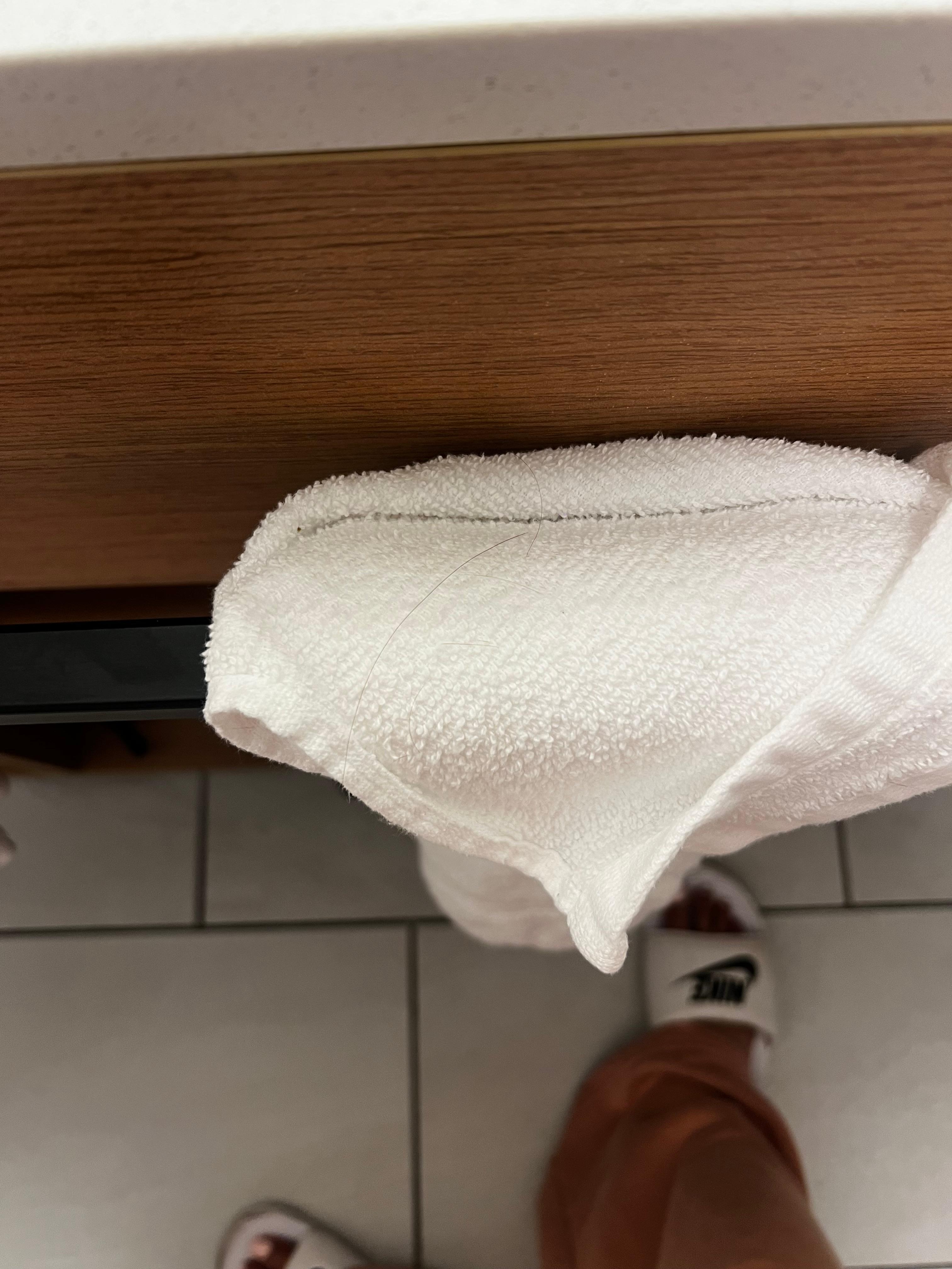 Hair on other towel