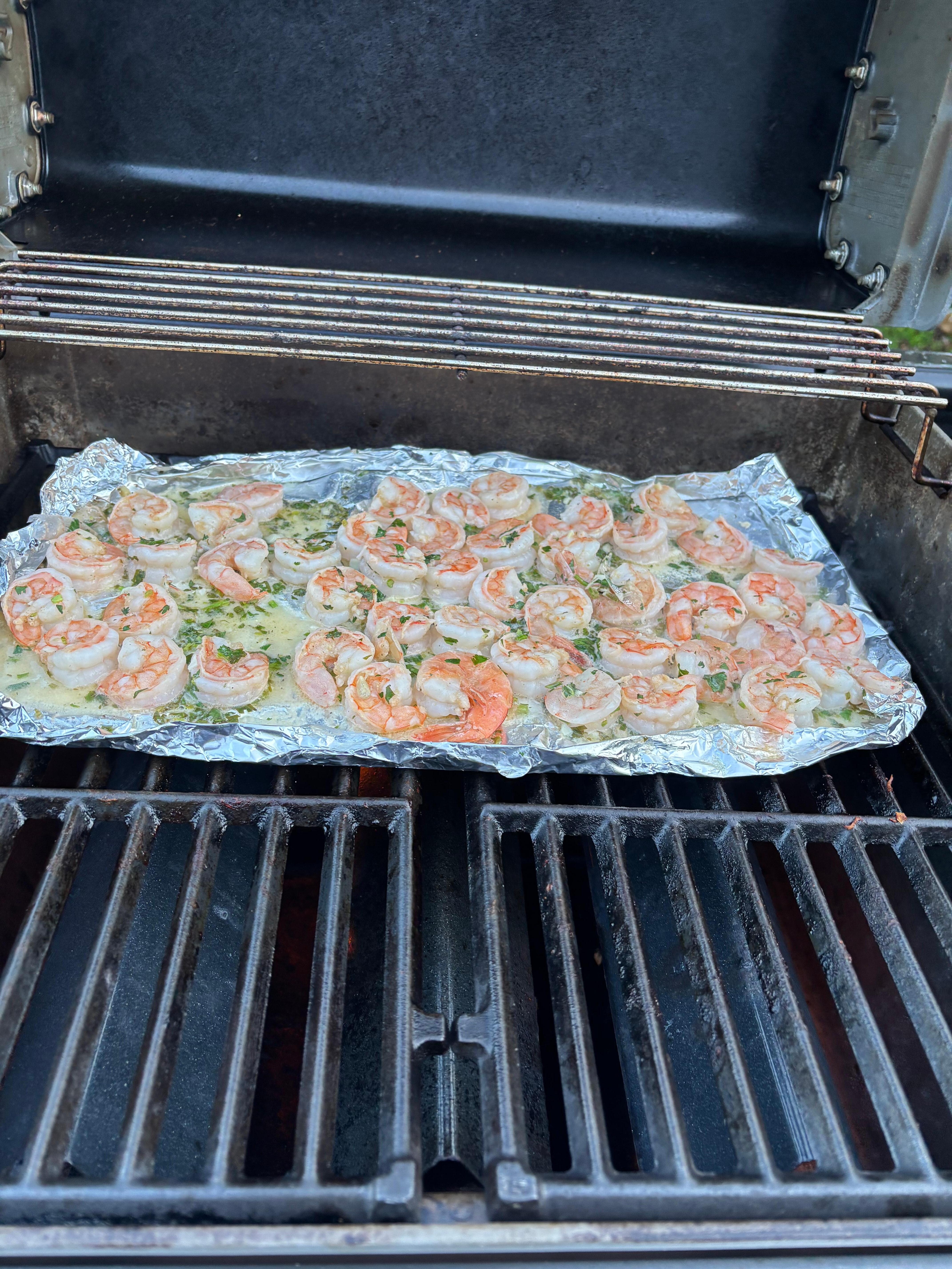 Grilling fresh shrimp on the grill.