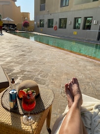 Relaxed by the pool