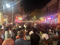 Outside the main entrance on a weekend on Bourbon Street in the French Quarter.