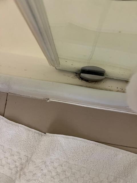 shower need to be cleaned couldn't move the door to open. It was hard to open the door.