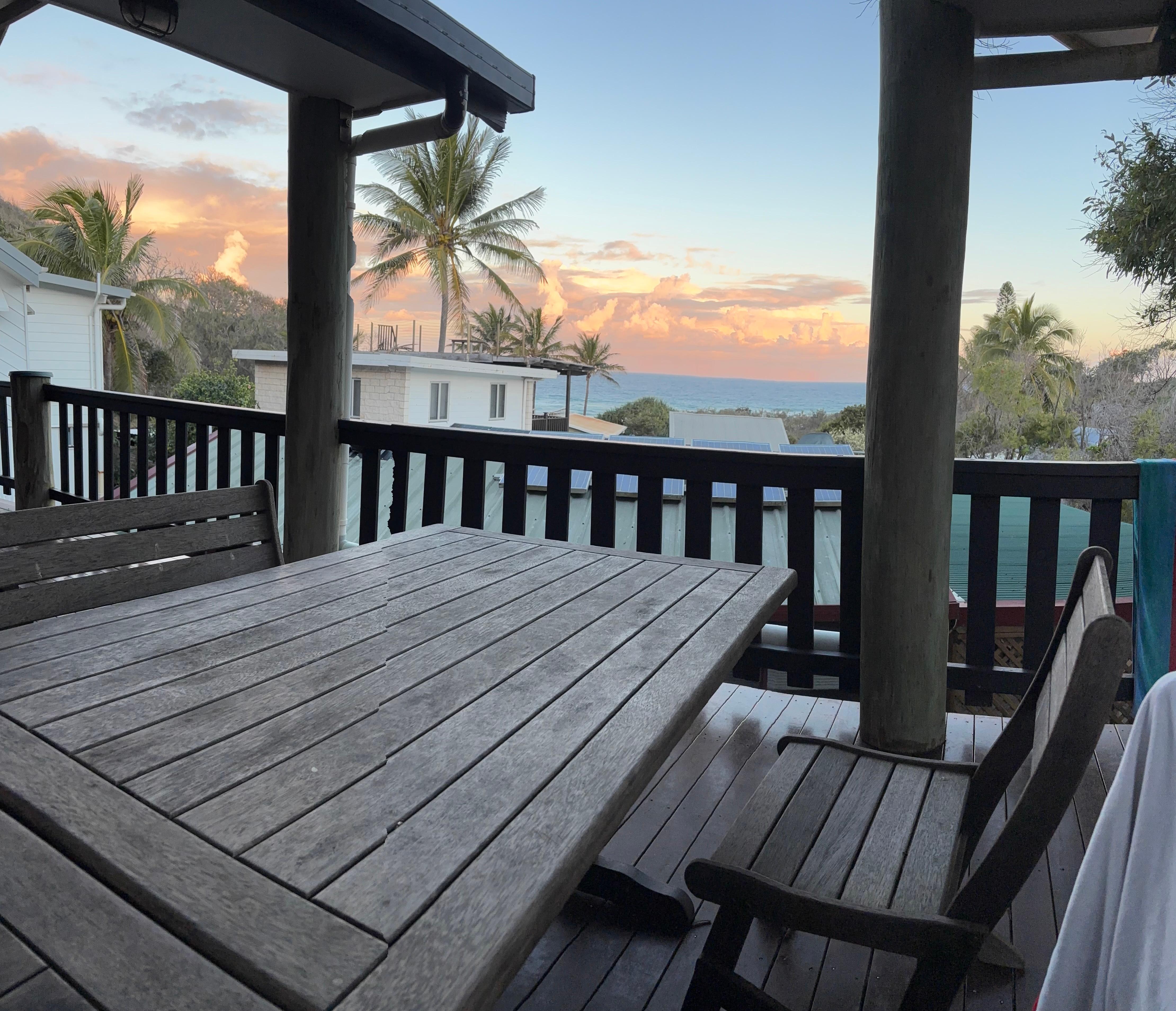 Photo of sunset over the ocean from the deck. 