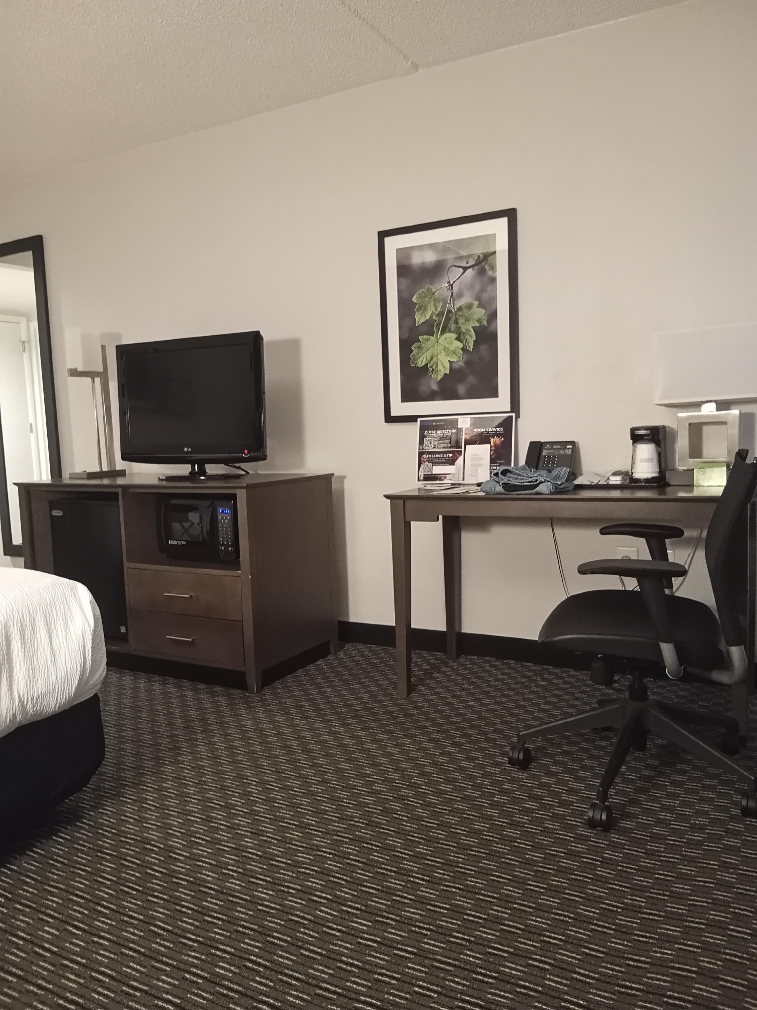 Room yet neat, TV off now...room comfortable 