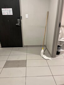 Mop left outside bathroom. Floor impossible to mop to dry state. I had to used towels.