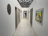 Hall way to downstairs bedrooms