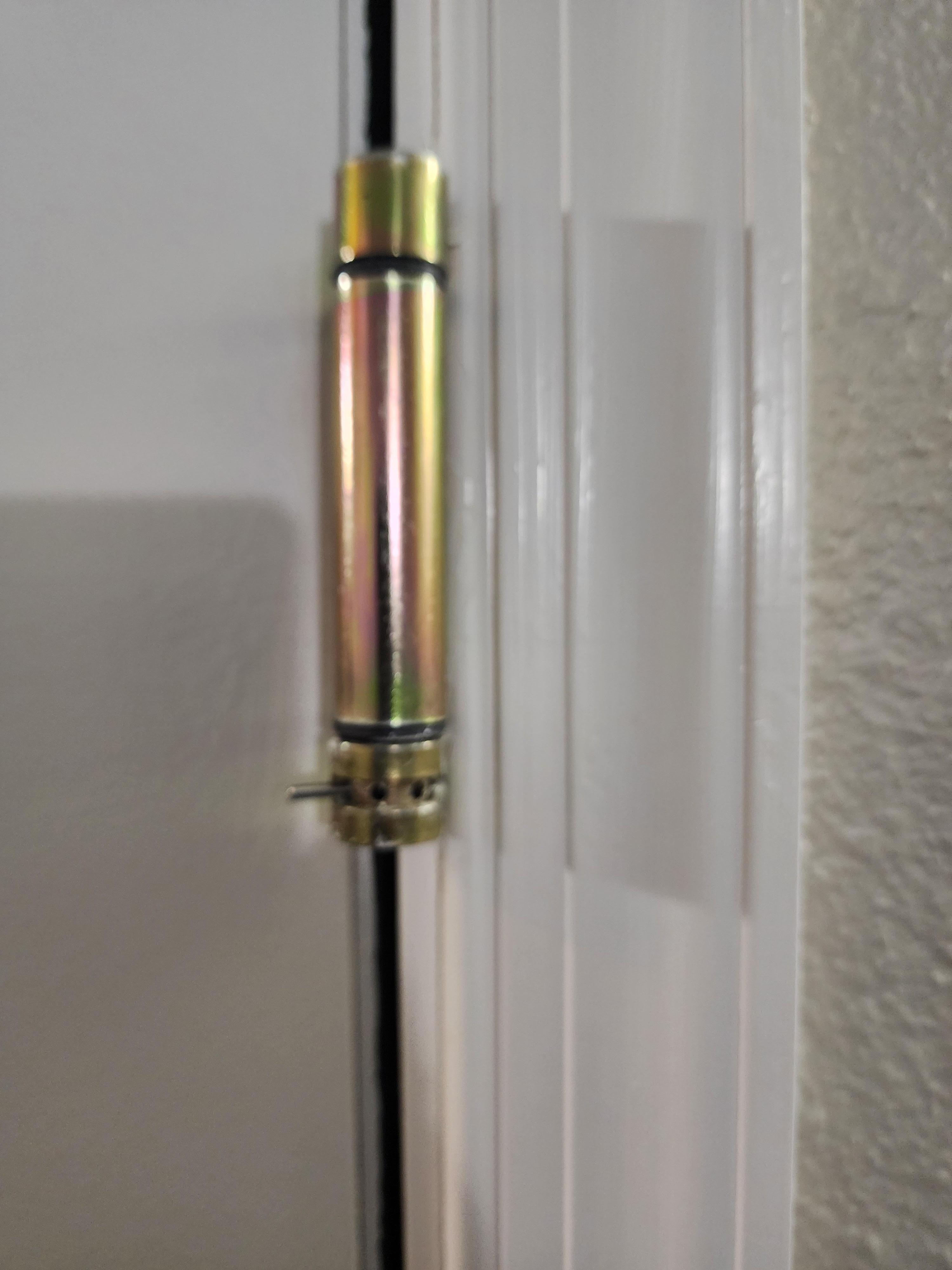 The self closing doors to the building did not close making it a security issue