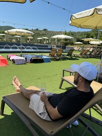 Wine and pool with views.