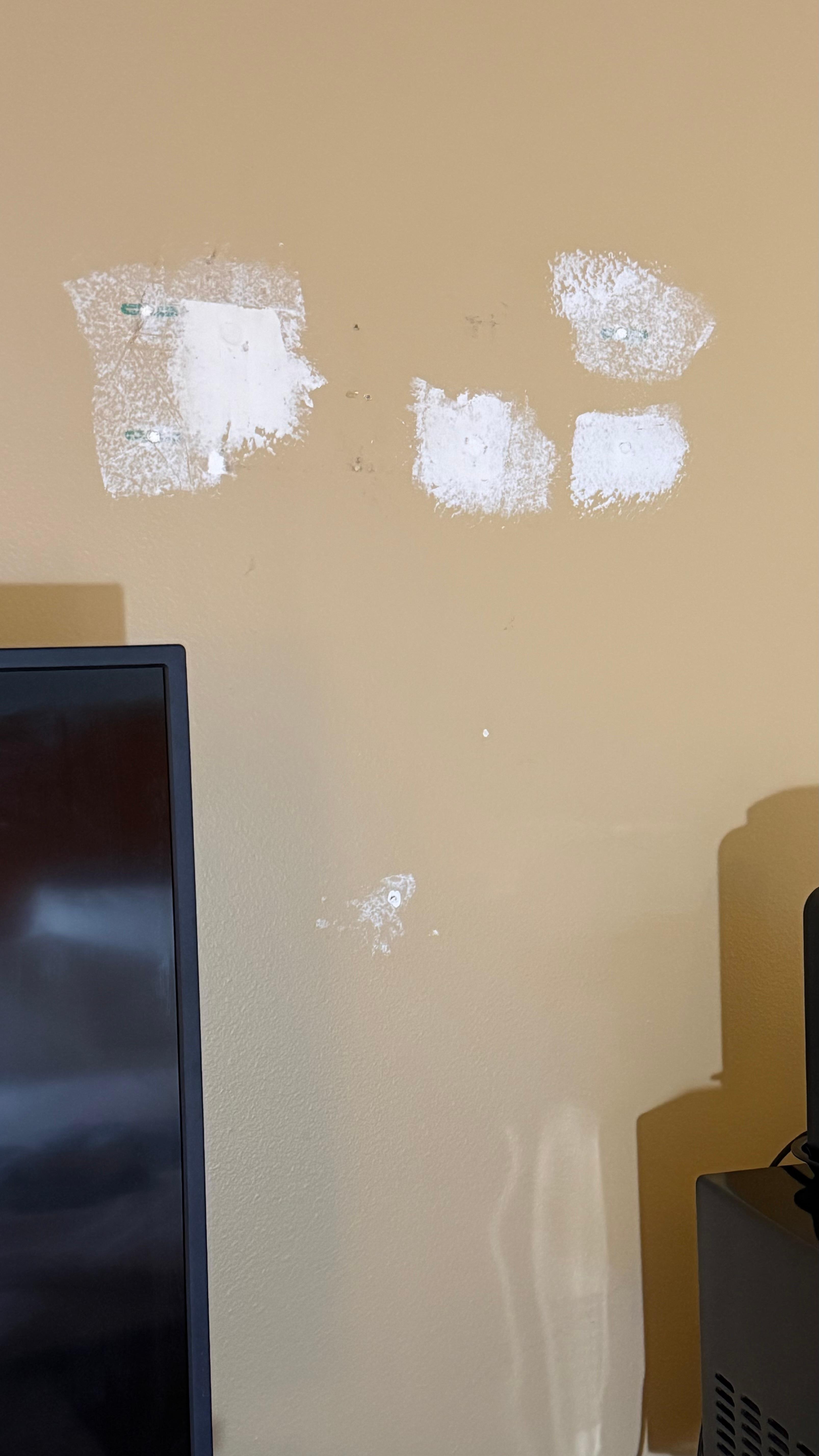 The wall above the tv