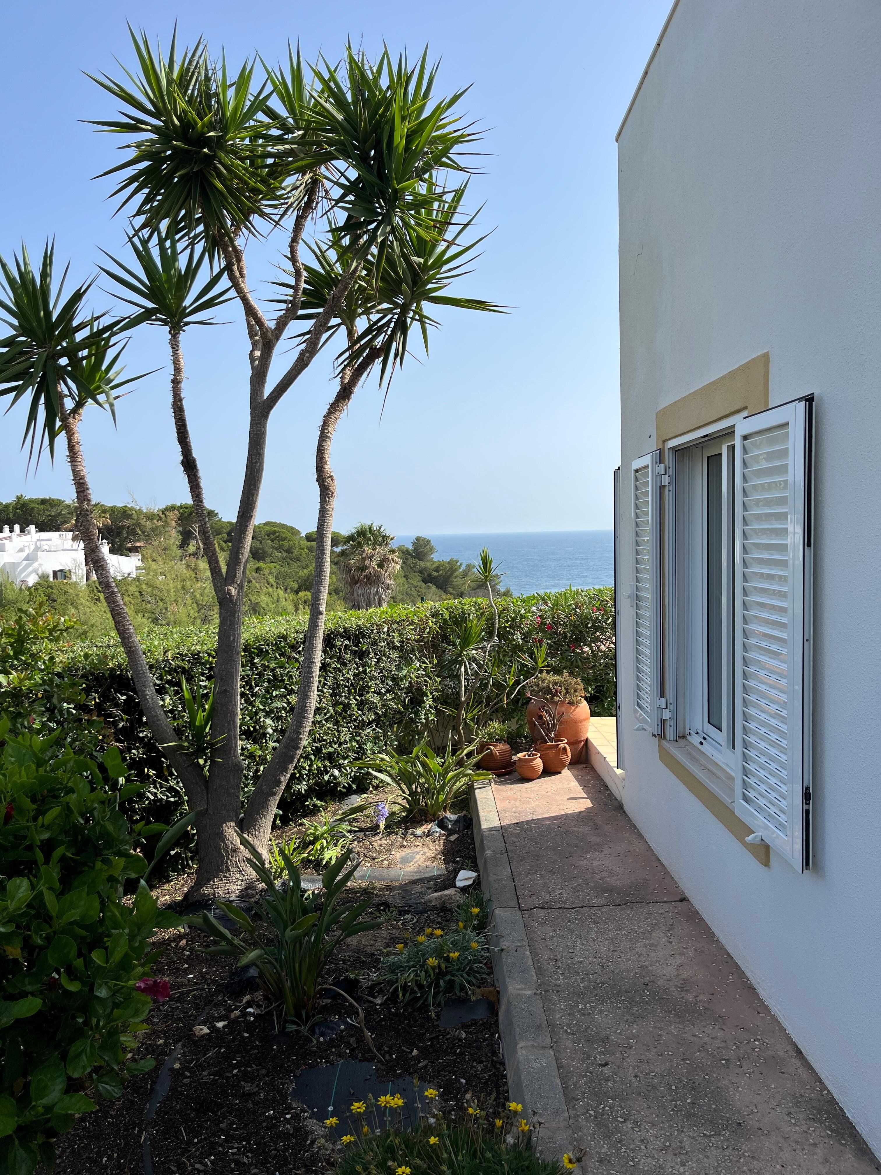View walking to villa entrance