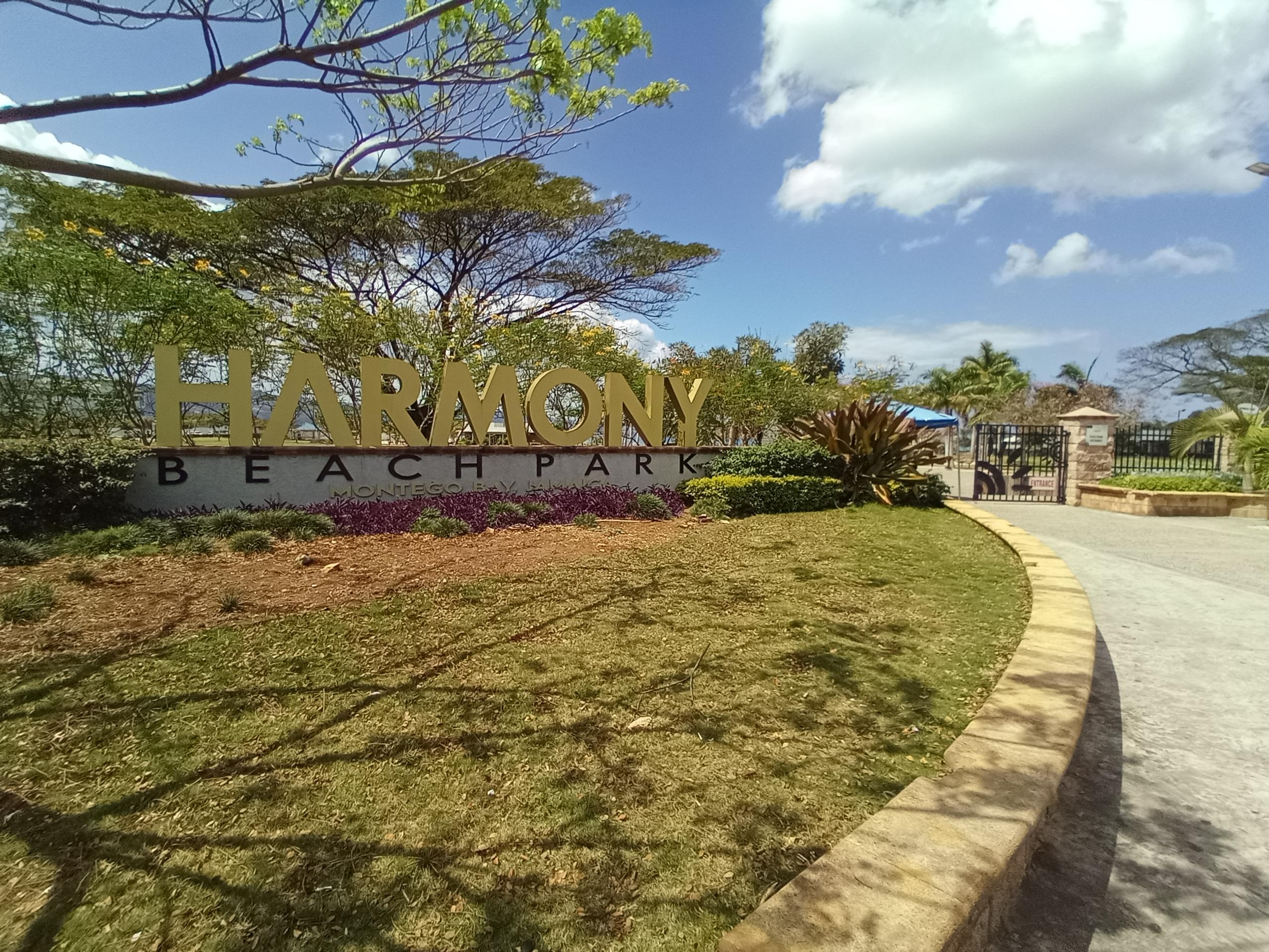 Main gate with Free entrance to the Harmony Beach Park with access to snack huts serving cold refreshments, burgers, fries, Jamaican paddies & more, also chaise lounges, umbrella's, lifeguard & security all on duty during open hours daily!