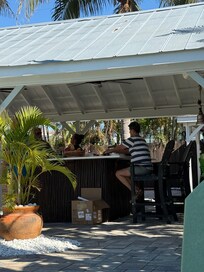 Open bar with ample seating - several tvs.