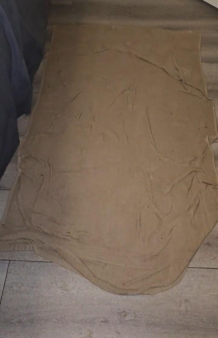 Soaked towel from water coming from floor