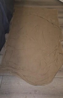 Soaked towel from water coming from floor