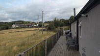 Some private fencing along here as well b much nicer so we could leave decking doors open