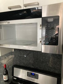 There are 2 microwaves and neither work properly!