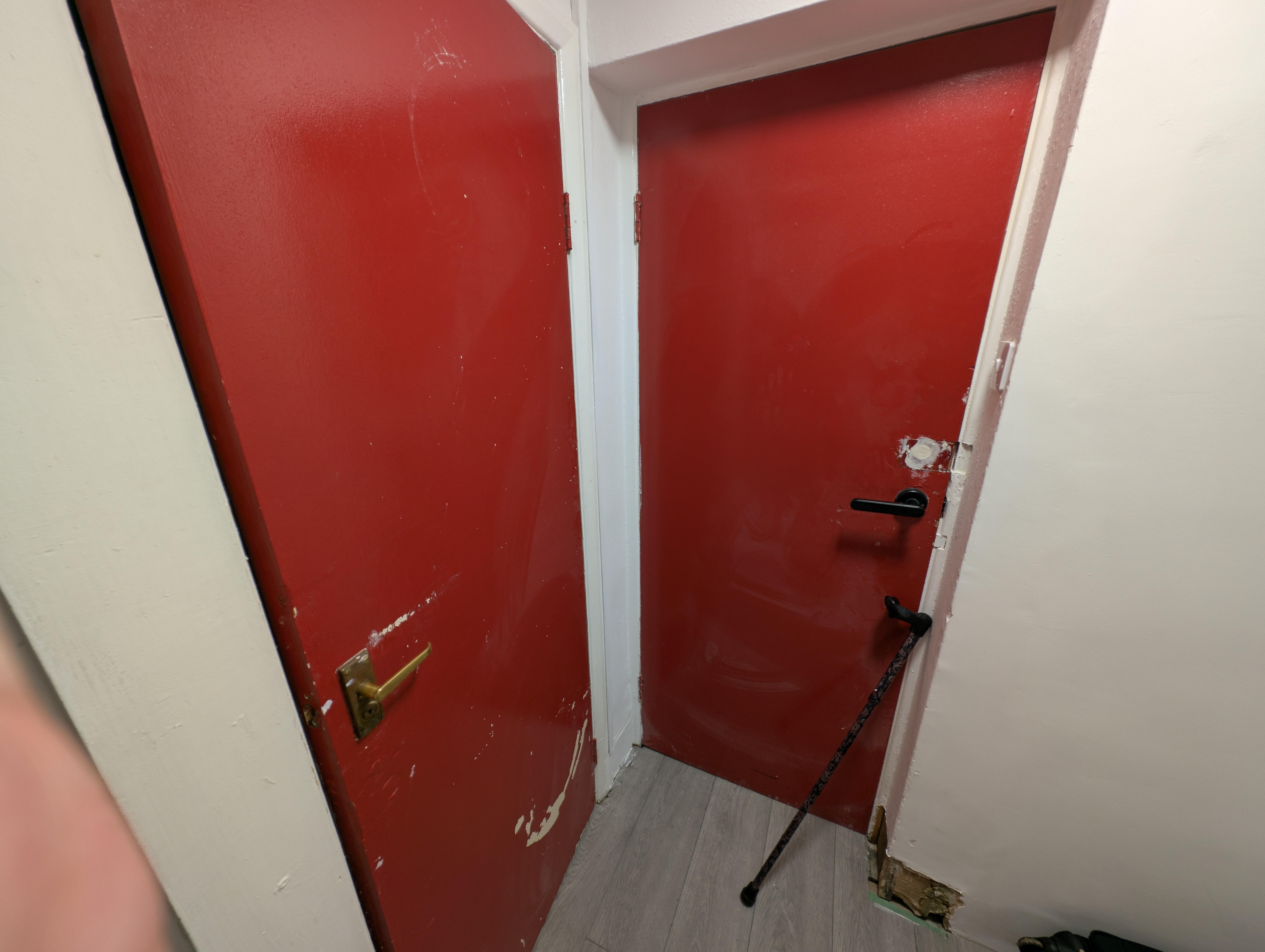 The doors were badly damaged and covered in sanding dust