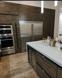 Kitchen design is beautiful and is ever spacious! Has all the tools and appliances needed for a feast!