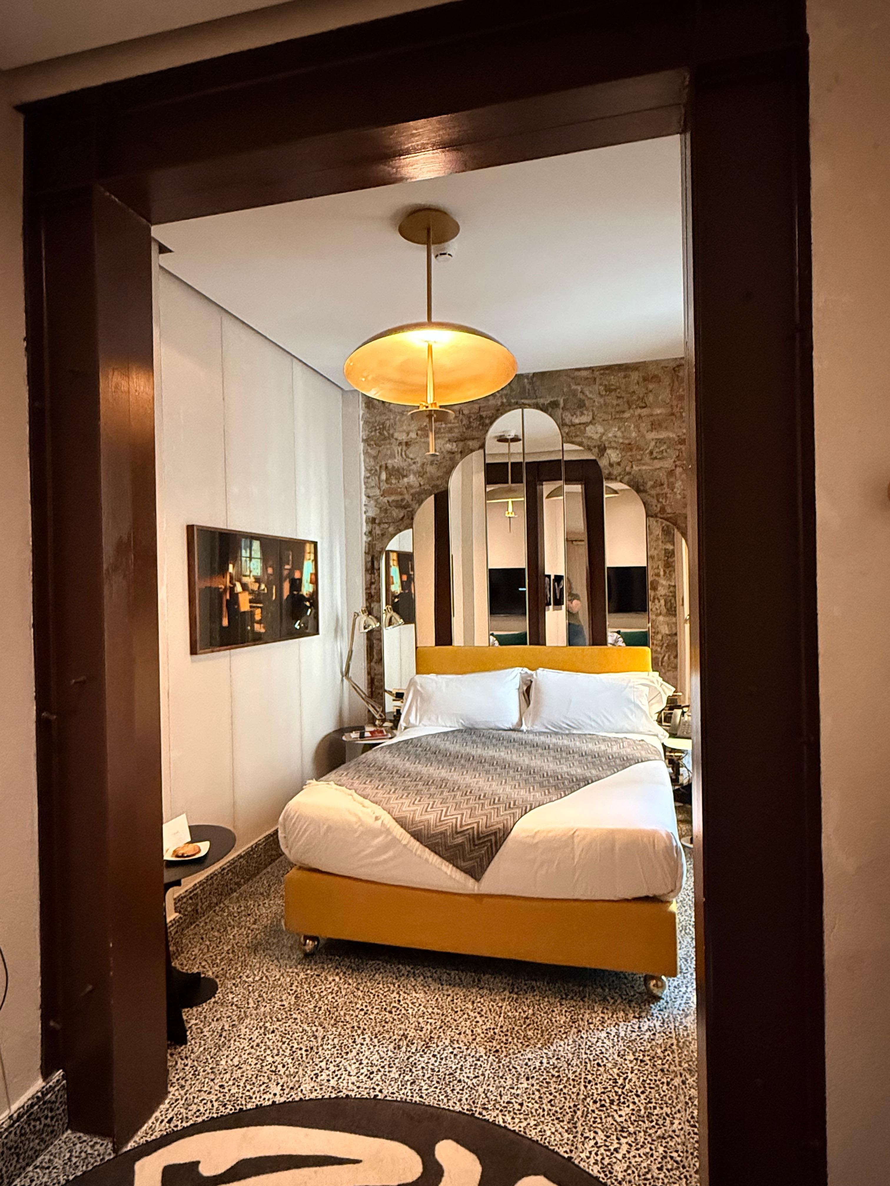 This opened up to a larger space with a love seat, armor and large window that connected to the bathroom.