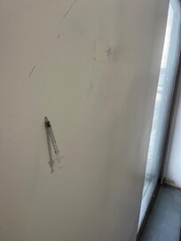 Used needles in the stairwell.