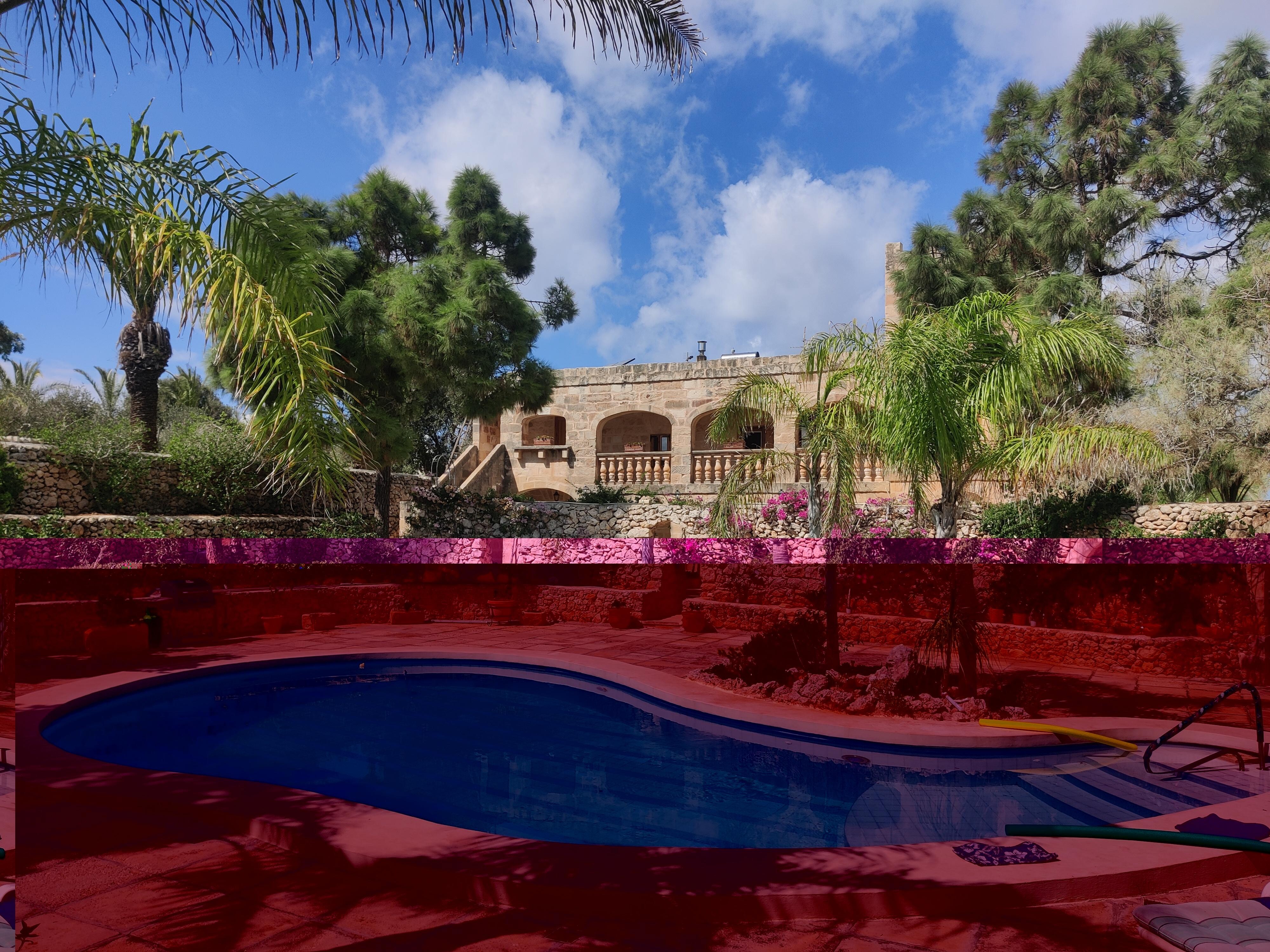 The pool, looking out from our villa